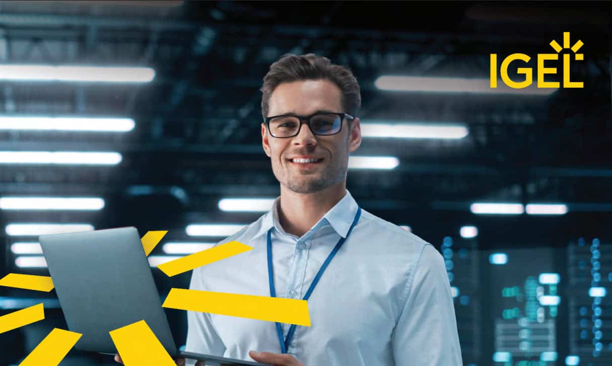 Happy IGEL customer holding notebook in his hands